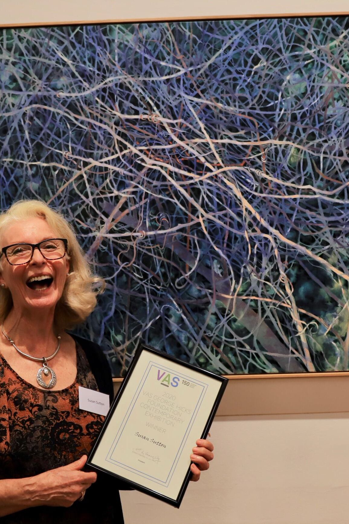 150th Anniversary Event Image prize winner with painting